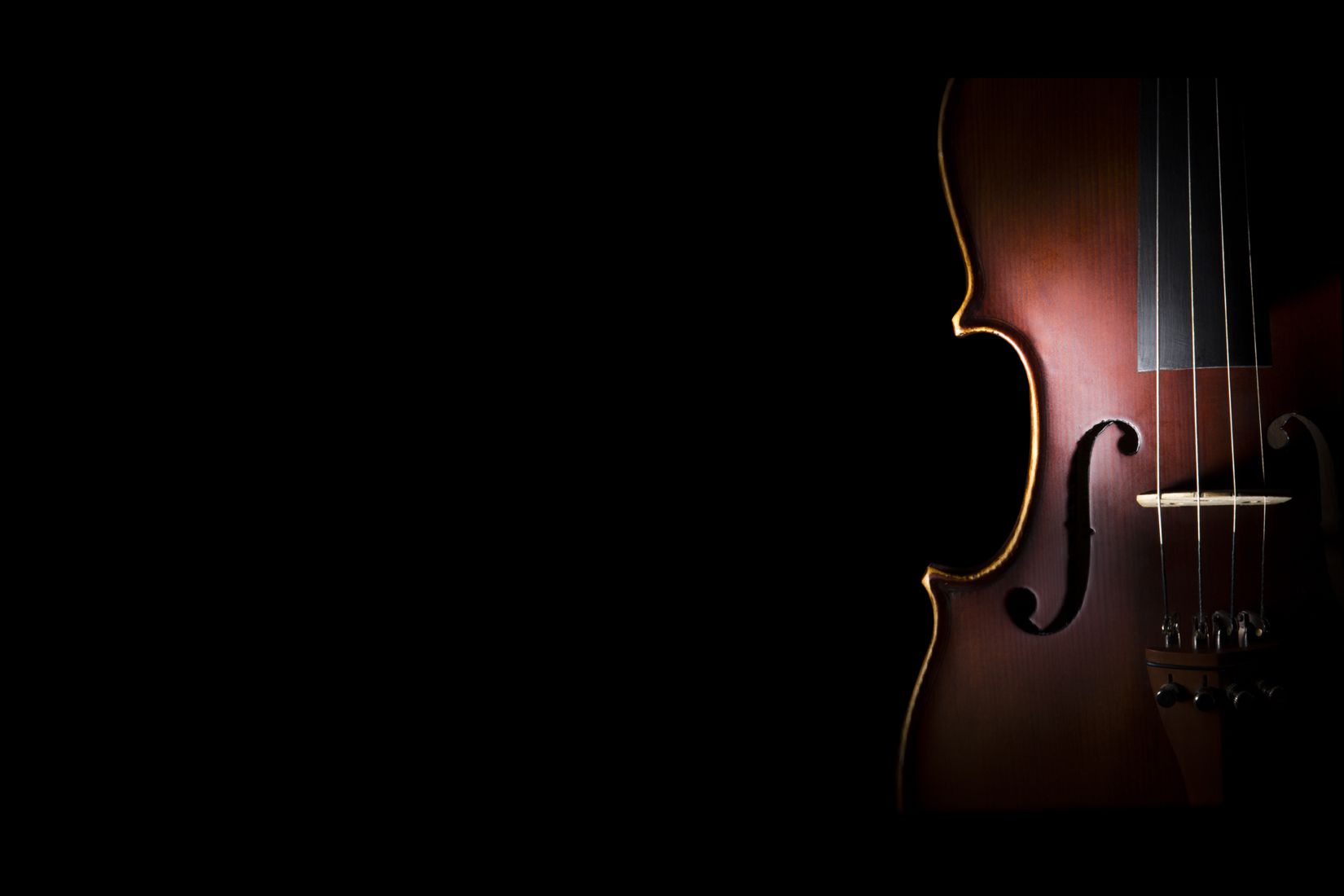 Violin in a dark setting